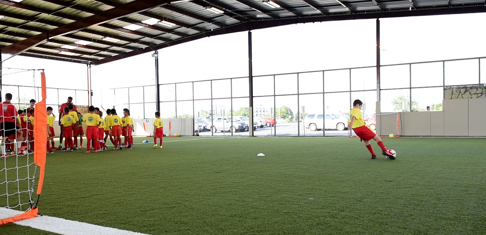 soccer team playing in Round Rock Sports Center Pavilion