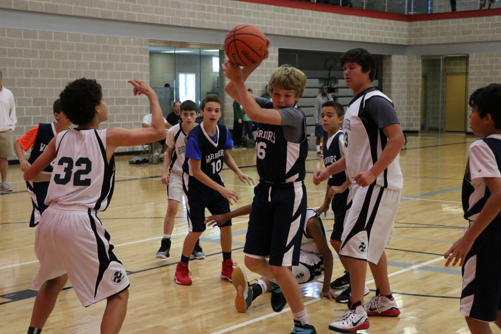 Boys playing basketball at the Round Rock Sports Center