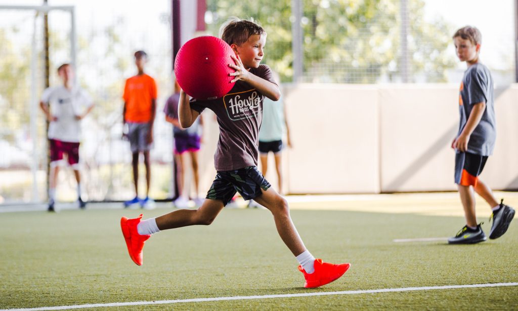 An athlete playing dodgeball